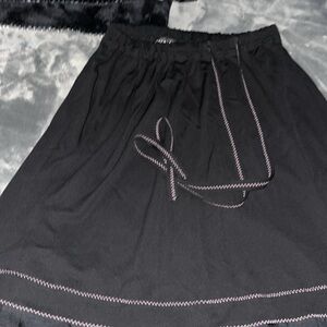 Preloved Chanel skirt size 38 excellent condition color black has no pockets.